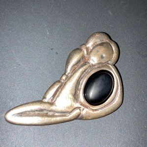 Silver and black stone brooch